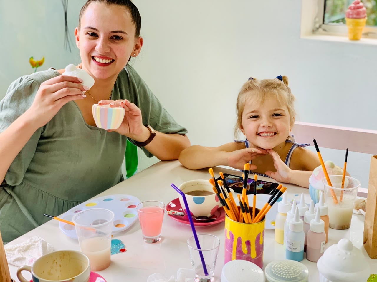 Mum and daughter enjoying a painting session