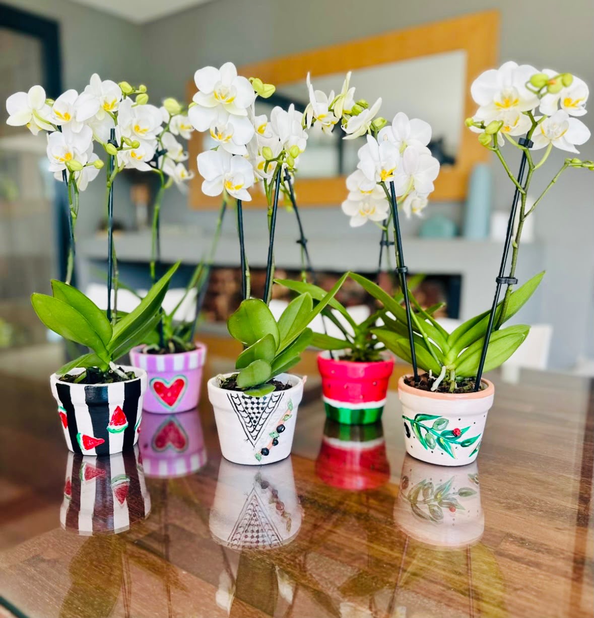 Hand painted ceramic pots with orchids